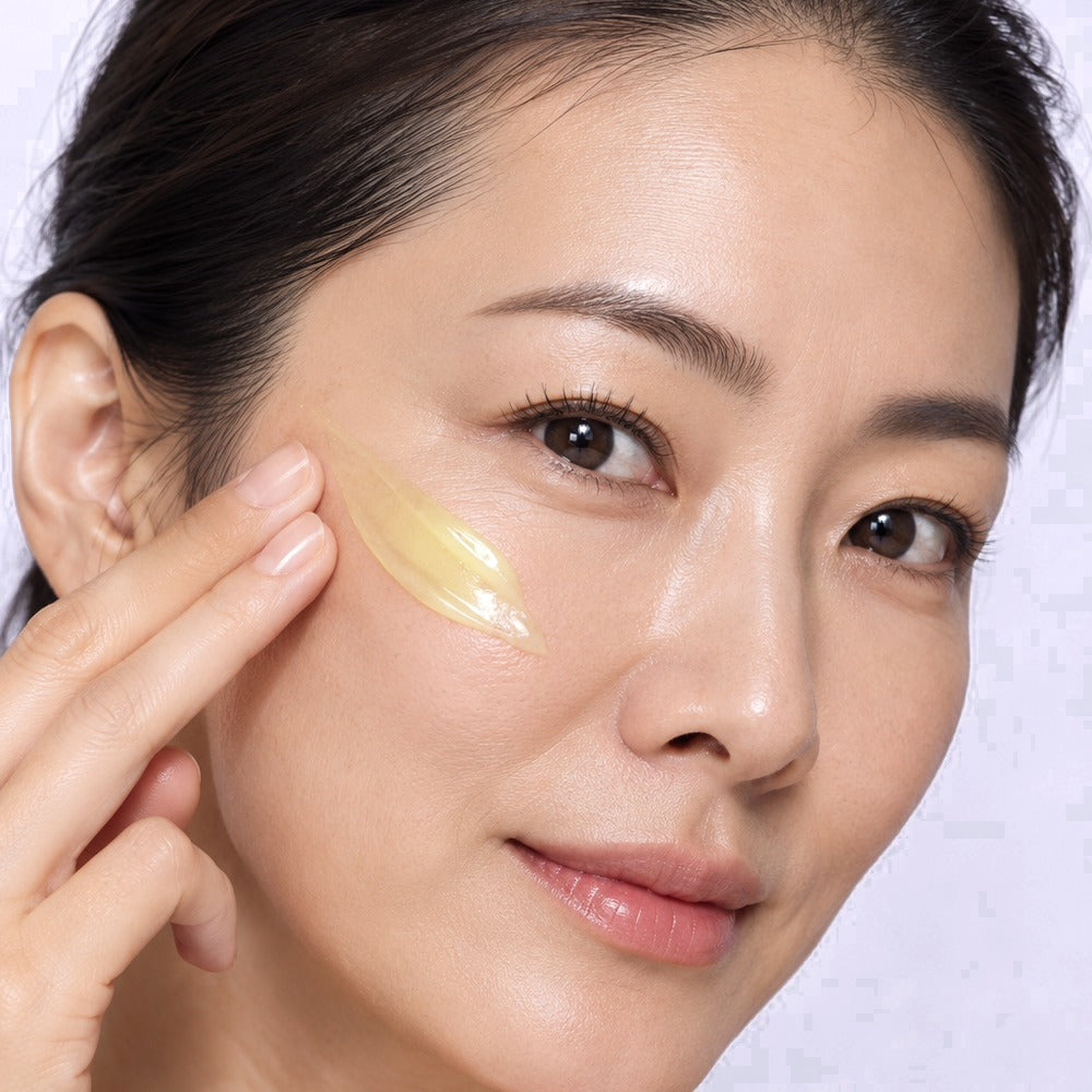 Applying the Retinal Booster along the cheekbone