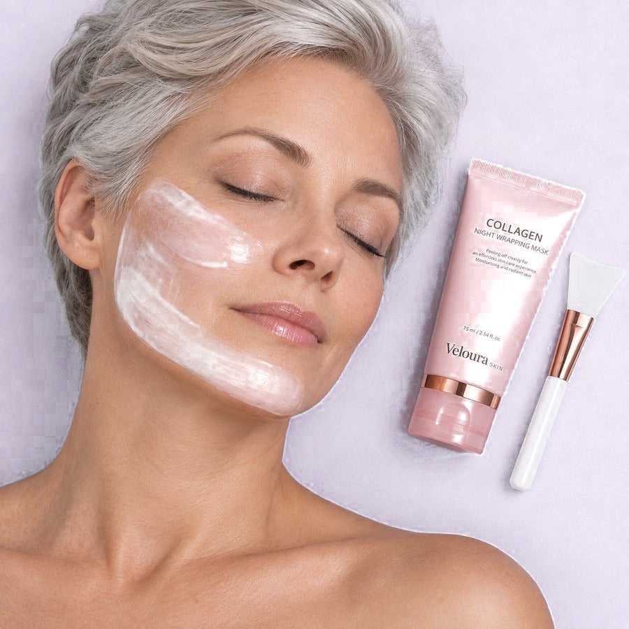 The Night Wrapping Mask on the cheek with the tube and applicator in frame